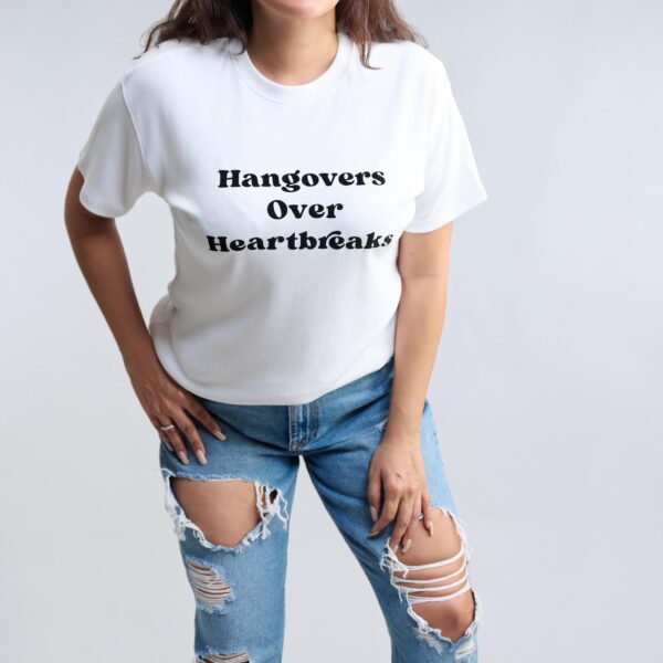 The Heartbreak: Hangovers over heartbreaks. T-shirts from The Skinny Cow, we are not dairy farmers.